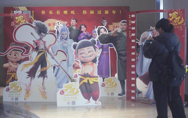 《哪吒2》票房登顶只是起点？周边爆卖、股价狂飙才是吸金“大杀器”