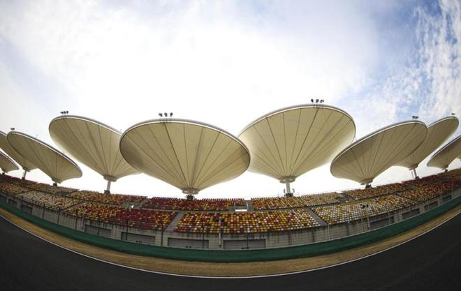 九游app：“F1中国站”硝烟再起赛车飞驰而过的“上”赛道藏着哪些“秘密”？(图7)