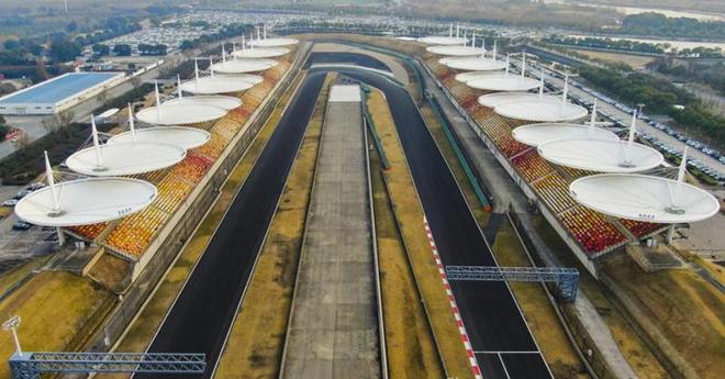 九游app：“F1中国站”硝烟再起赛车飞驰而过的“上”赛道藏着哪些“秘密”？(图5)